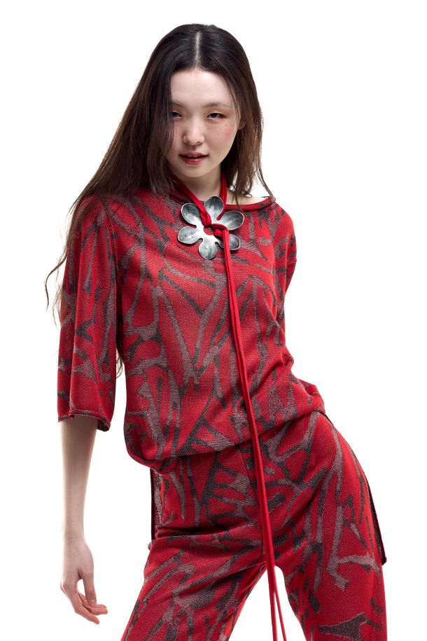 Roberta Redaelli primavera estate 2026, R1367 pull in maglia jacquard fiore grande tricolore corallo