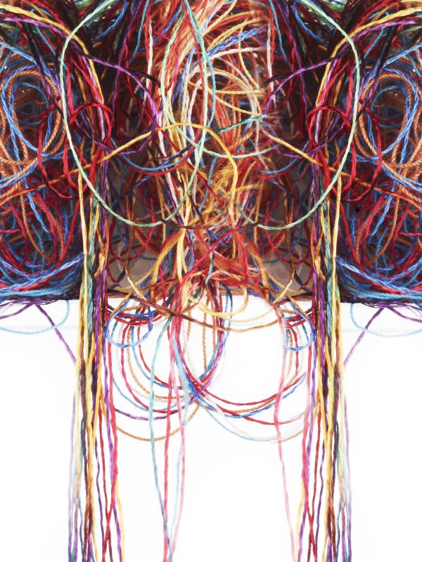 Scelta di filati di prima qualità e tessitura